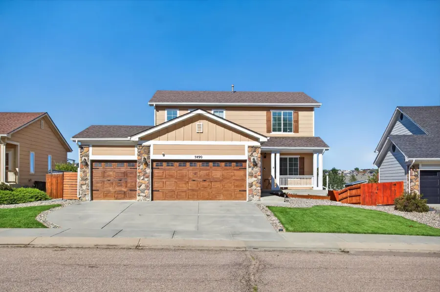 Exterior real estate photograph of 7490 Creekfront Dr., Fountain, Colorado