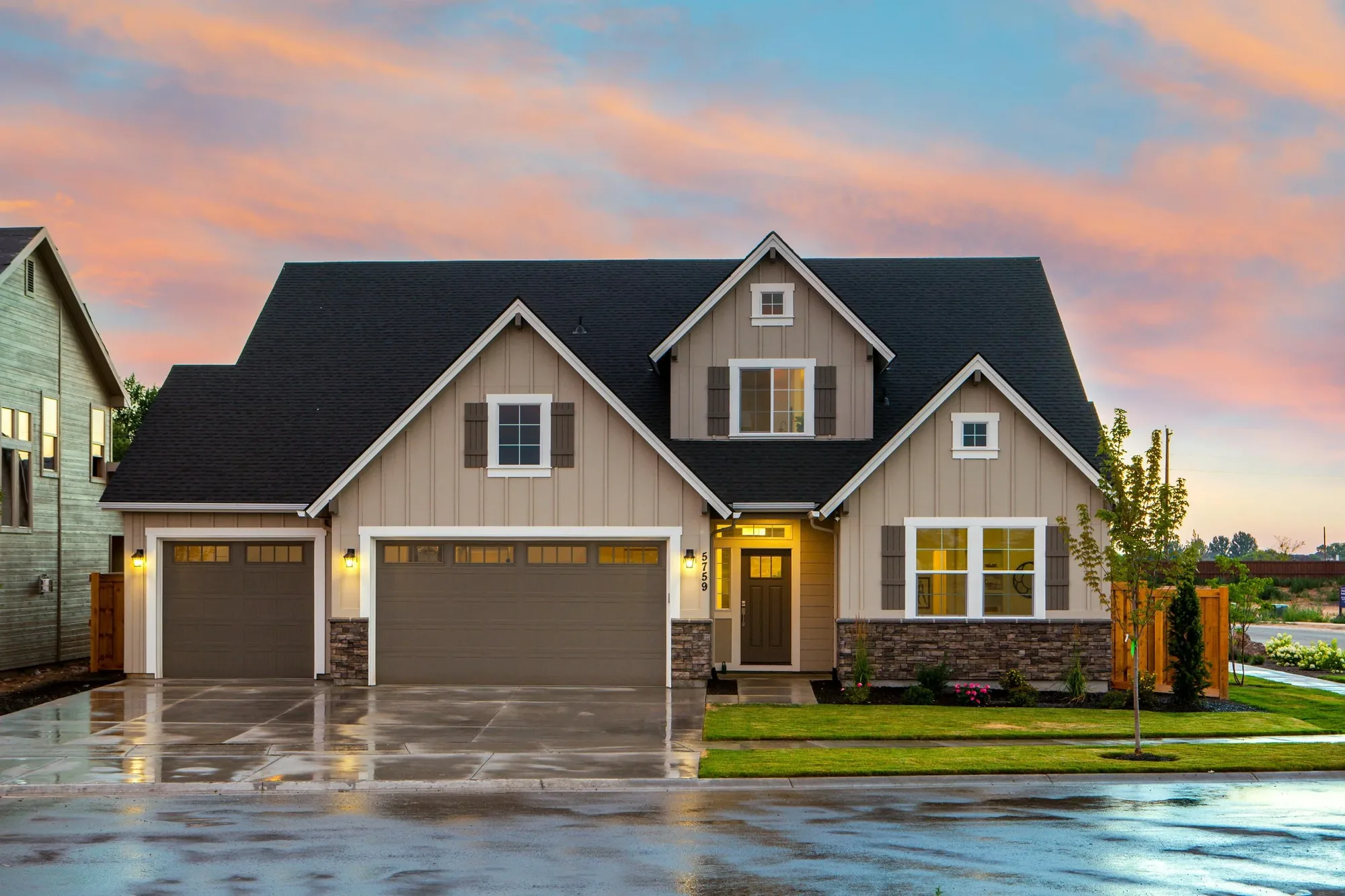 Craftsman-style home exterior at sunset photographed by Ridge Property Media