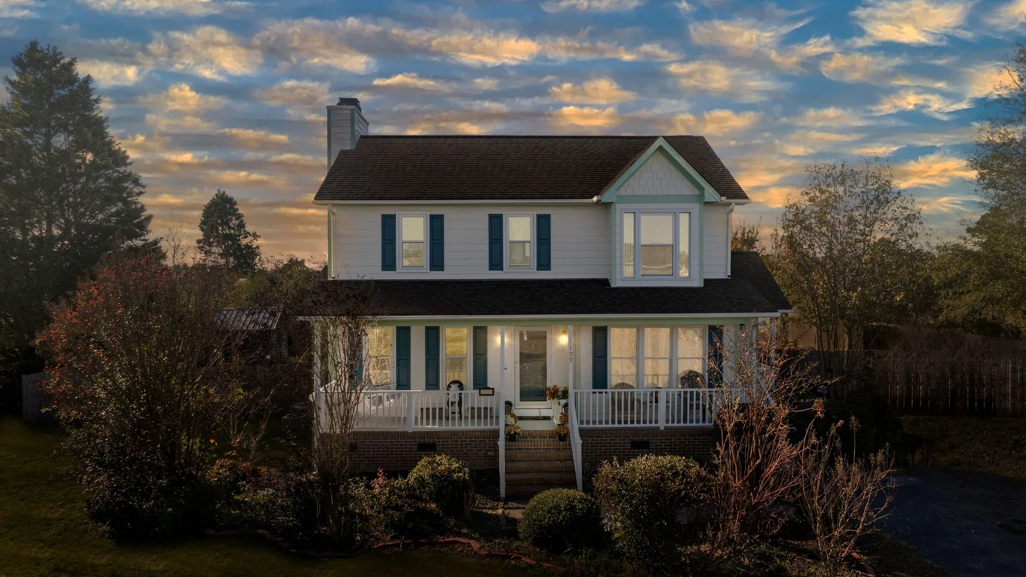 Two-story home exterior demonstrating virtual staging capabilities
