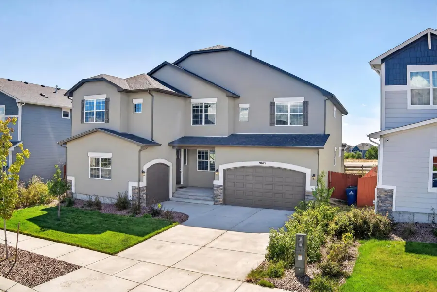 Exterior real estate photograph of 9622 Fairway Glen in Peyton, Colorado