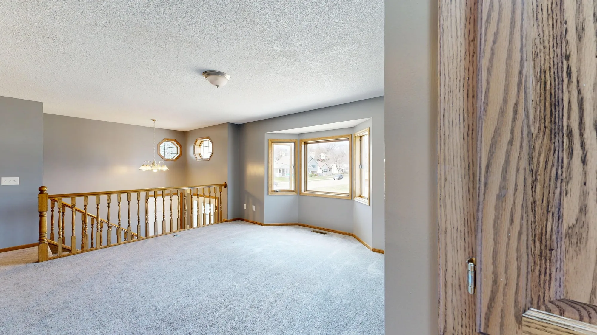 Cinematic walkthrough video still of a bright living room interior