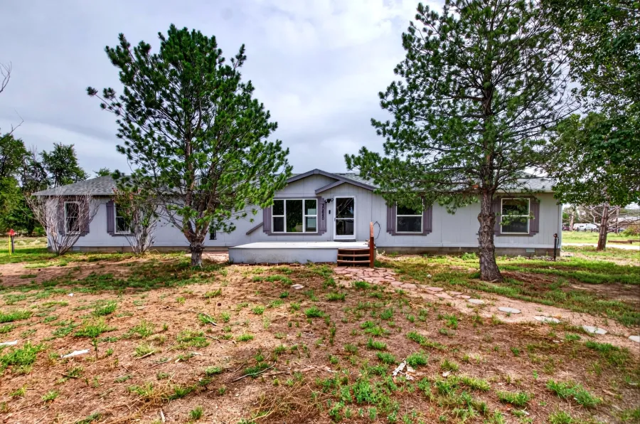 HDR exterior photograph of 30640 Aldred Rd, Pueblo